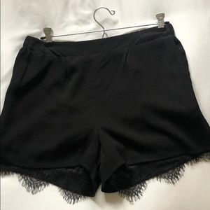 Cupcakes and Cashmere black shorts with lace trim